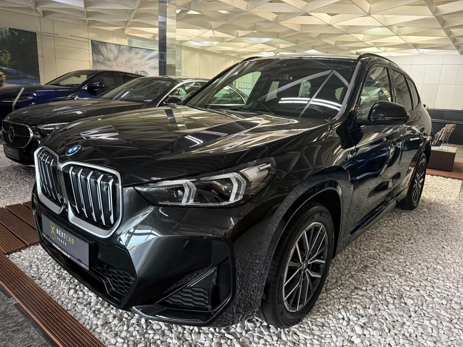 BMW iX1 30 xDrive M Sport — Foto 1